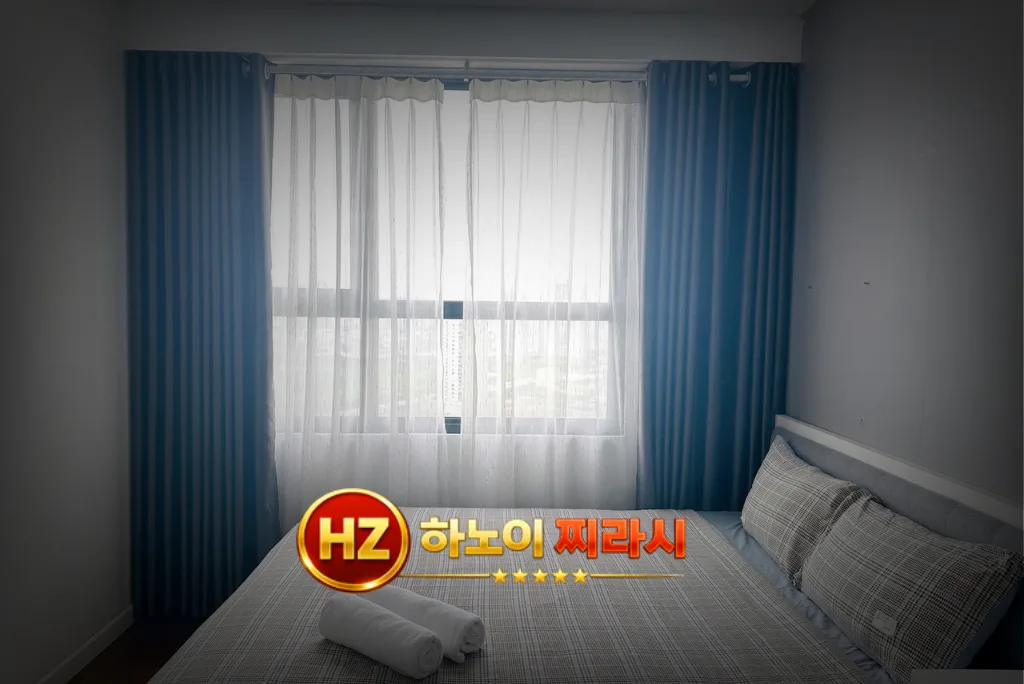 하노이 디 캐피탈 아파트 2룸 침실 분위기입니다.